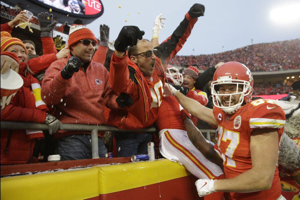 Kansas City Chiefs tight end Travis Kelce (87) celebrates with fans